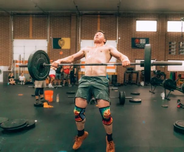 Man lifting heavy barbell