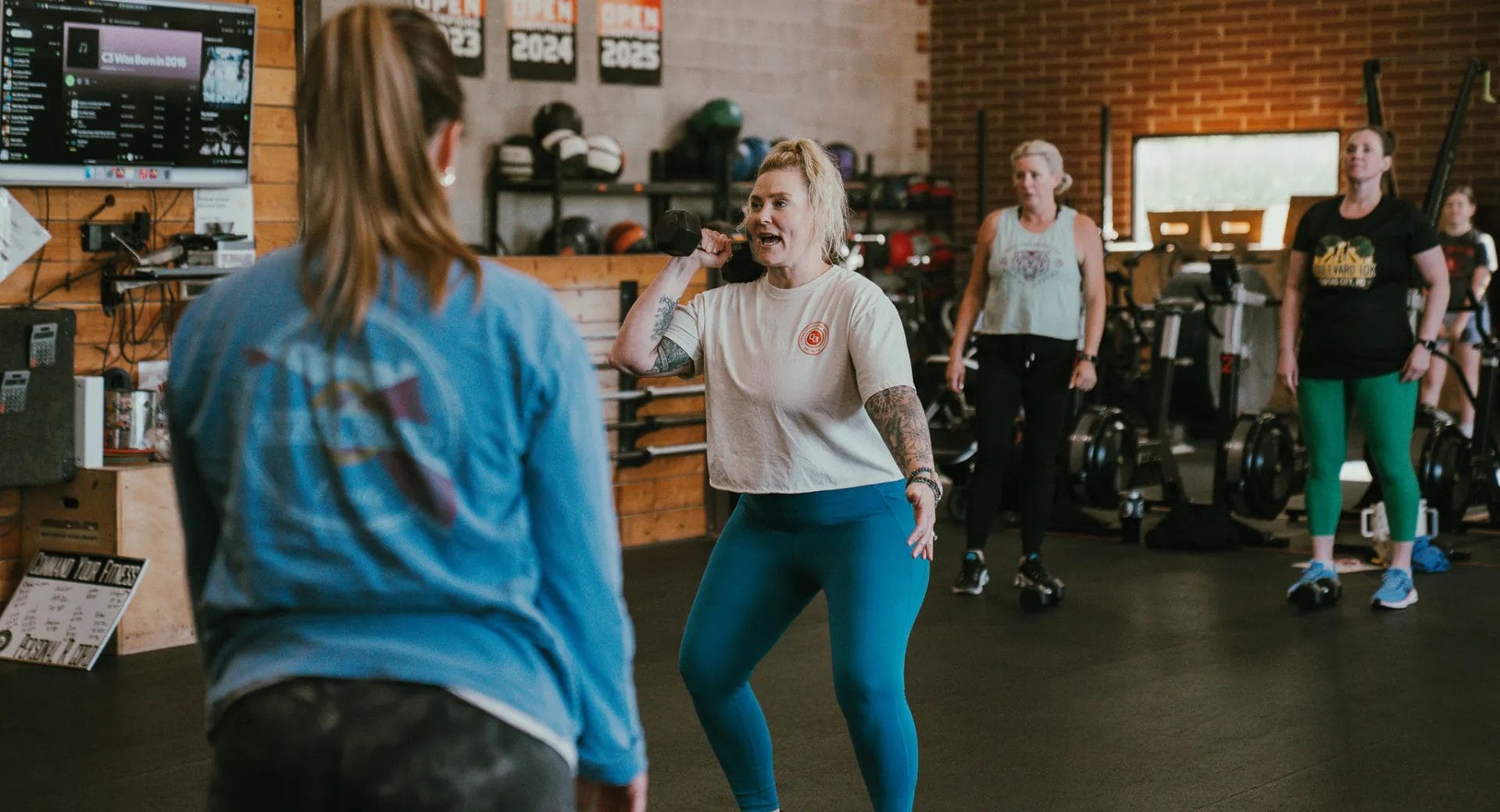 Woman lifting dumbbell